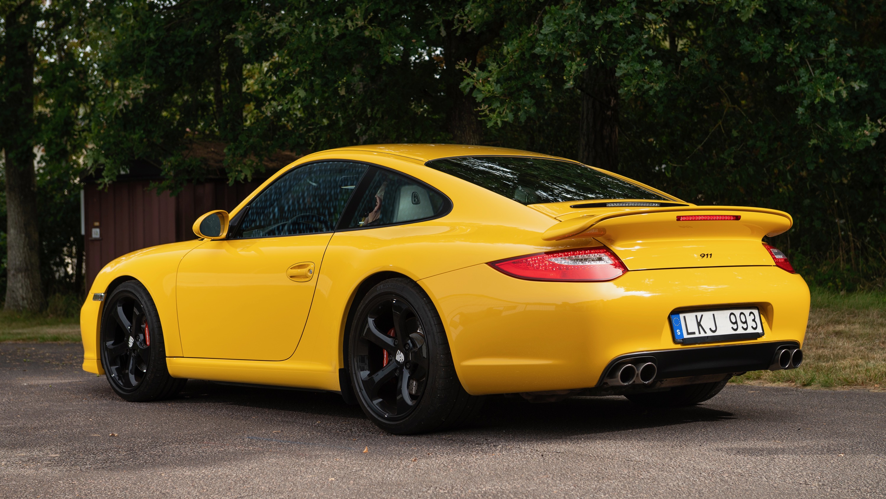 Porsche 997 snett bak vä